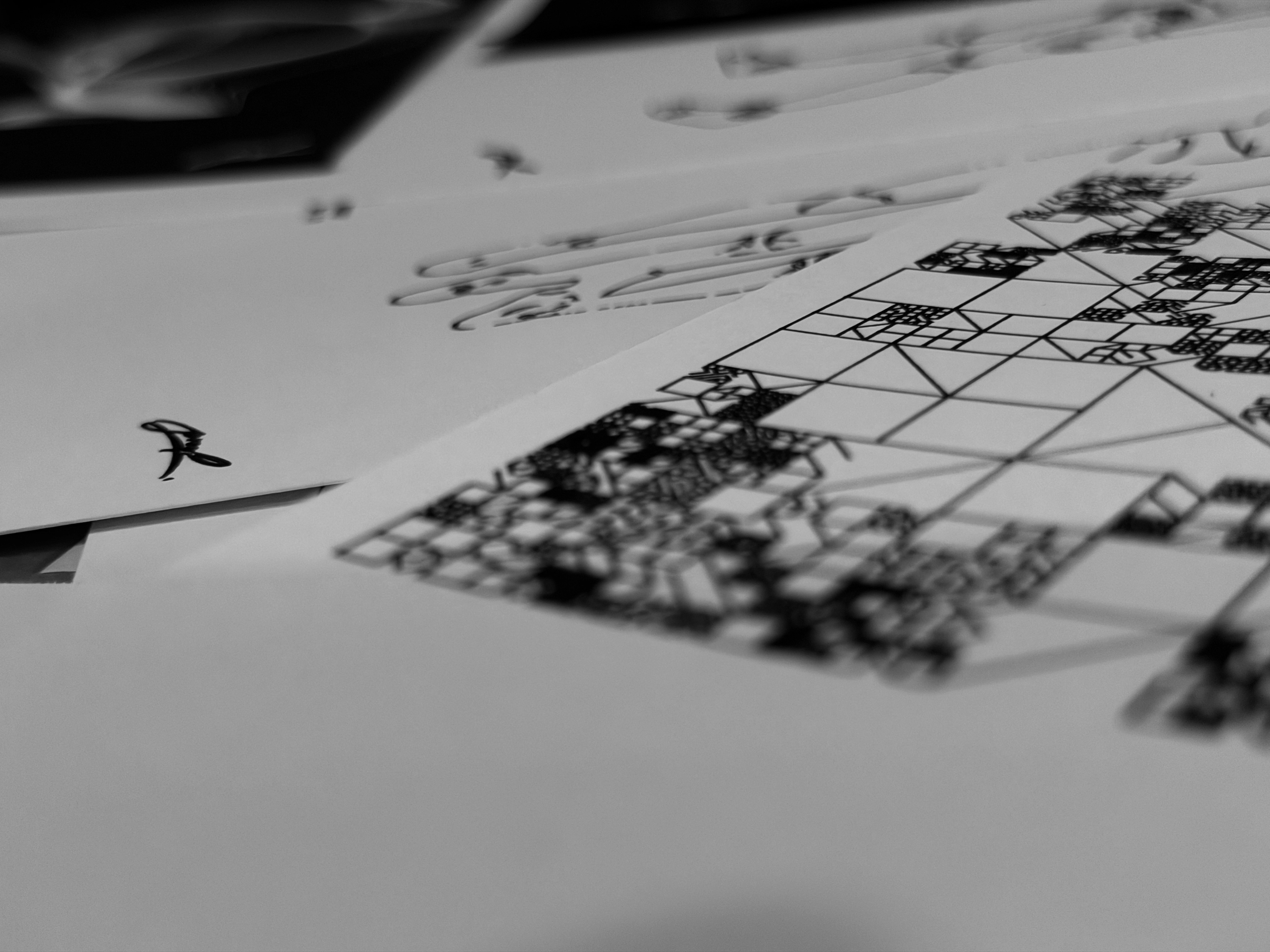 Studio stack — plotted prints from a single run